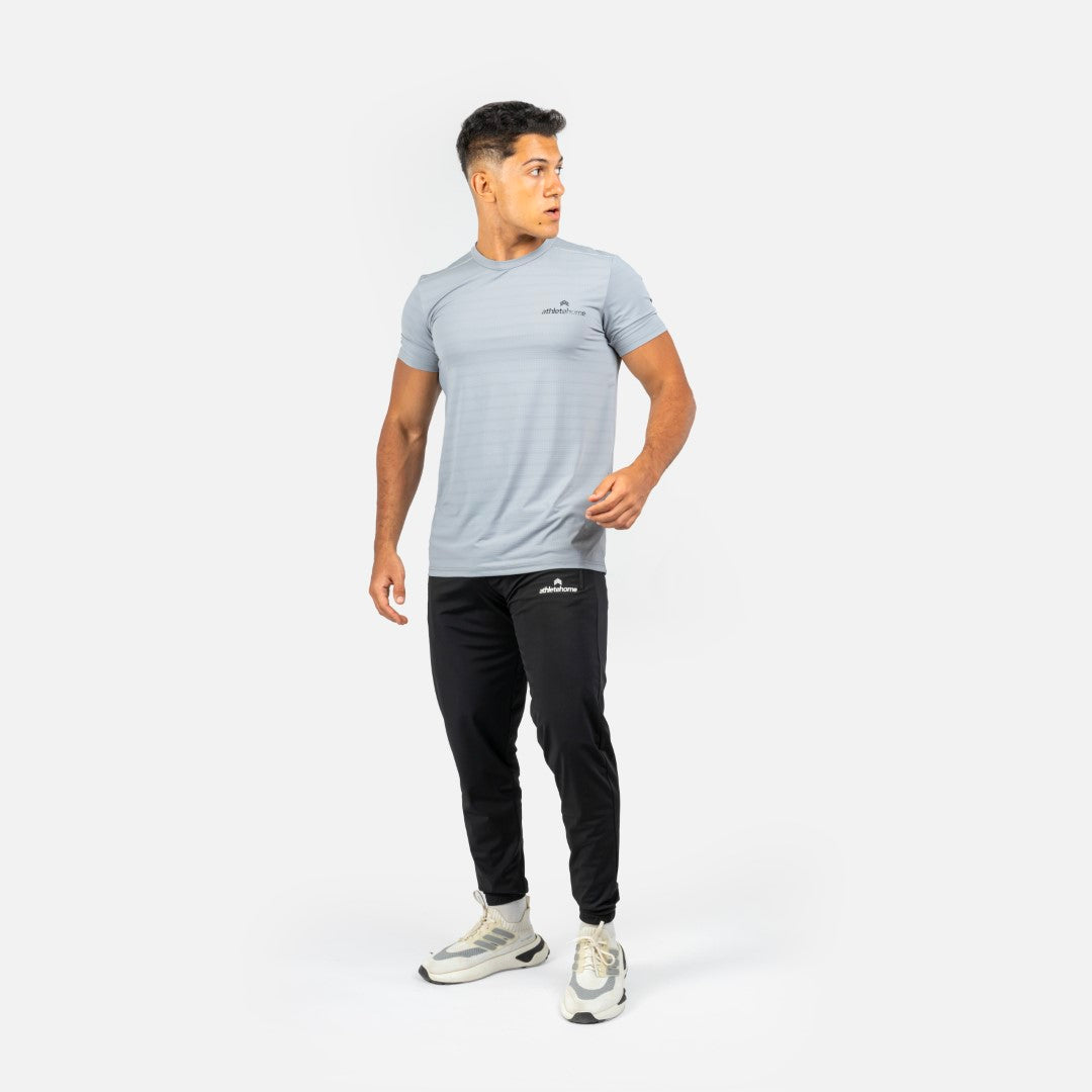 طقم تدريب رجالي Velocity من Athlete Home: تيشيرت Endurance مخطط للأداء وبنطلون رياضي Tapered | طقم خفيف الوزن يسمح بالتهوية للجيم والجري