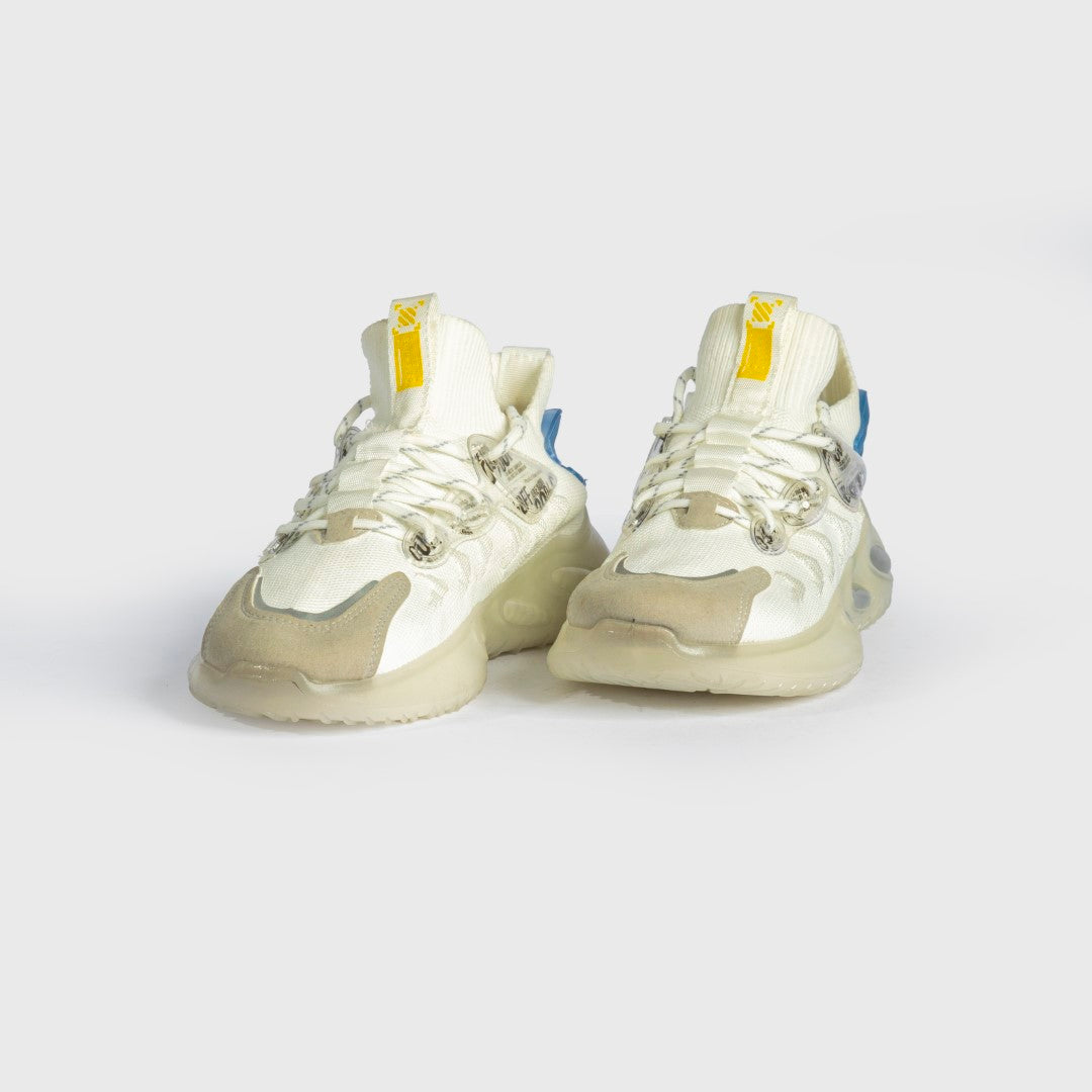 حذاء ترينر كينتيك-فلكس باللون العاجي والأزرق | سنيكرز للجنسين بأسلوب التك-وير مع وسائد هوائية | حذاء عالي الأداء للجيم والأناقة اليومية في مصر