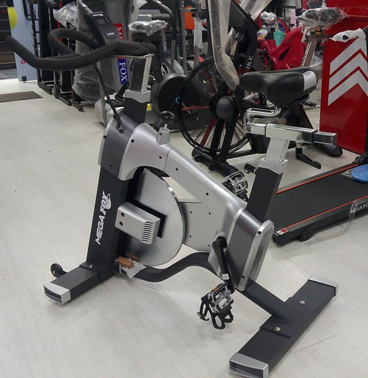 Mega Fox 250 Kg Max Heavy Duty Commercial Spinning Bike for Home and Gym Use - Belt Drive, Adjustable Resistance, LCD Monitor, Comfortable Seat Ideal for Intense Cardio, Weight Loss, and Endurance Training in Egypt