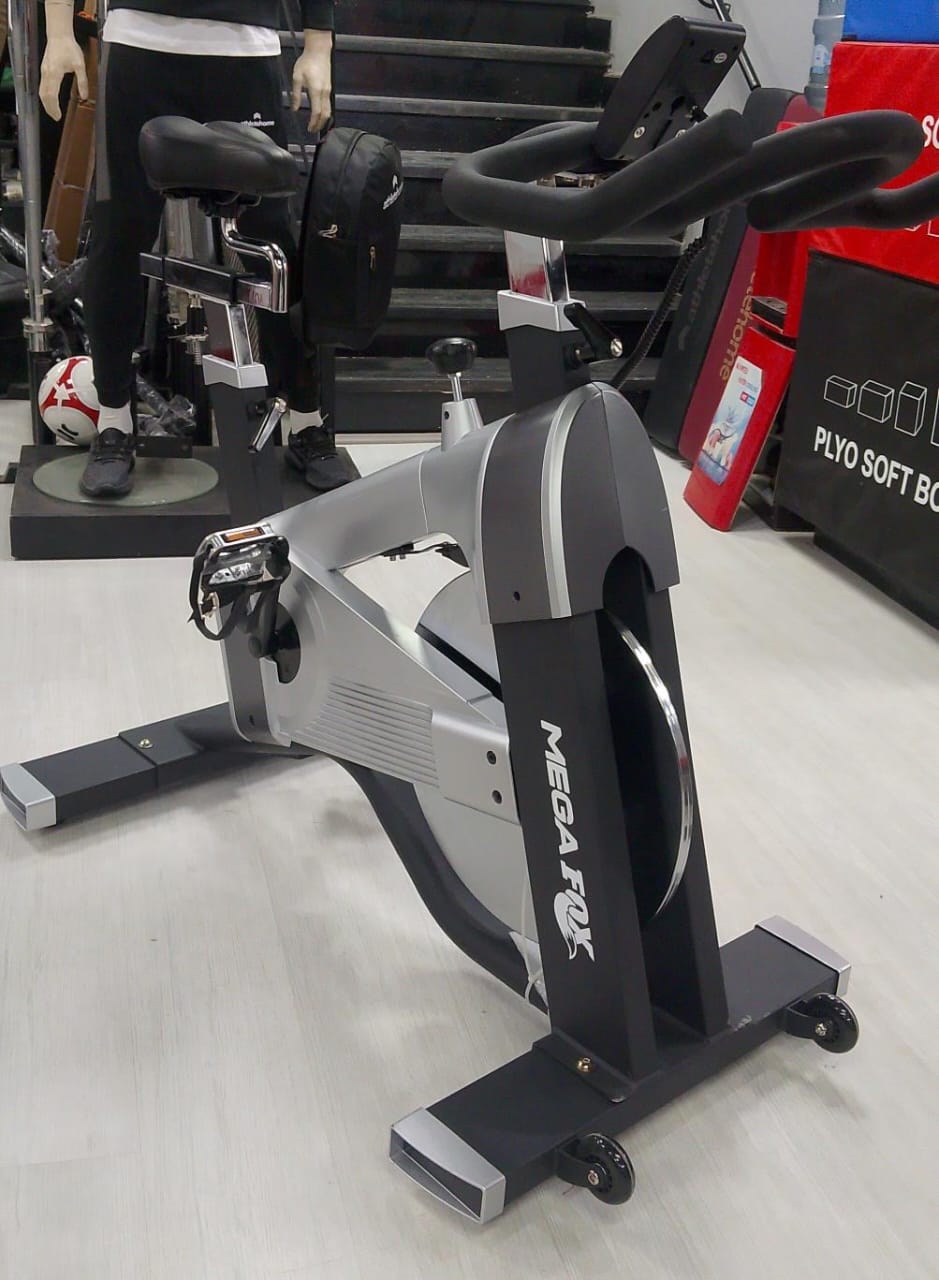 Mega Fox Heavy Duty Commercial Spinning Bike for Home and Gym Use - Belt Drive, Adjustable Resistance, LCD Monitor, Comfortable Seat - Supports up to 160kg - Ideal for Intense Cardio, Weight Loss, and Endurance Training in Egypt